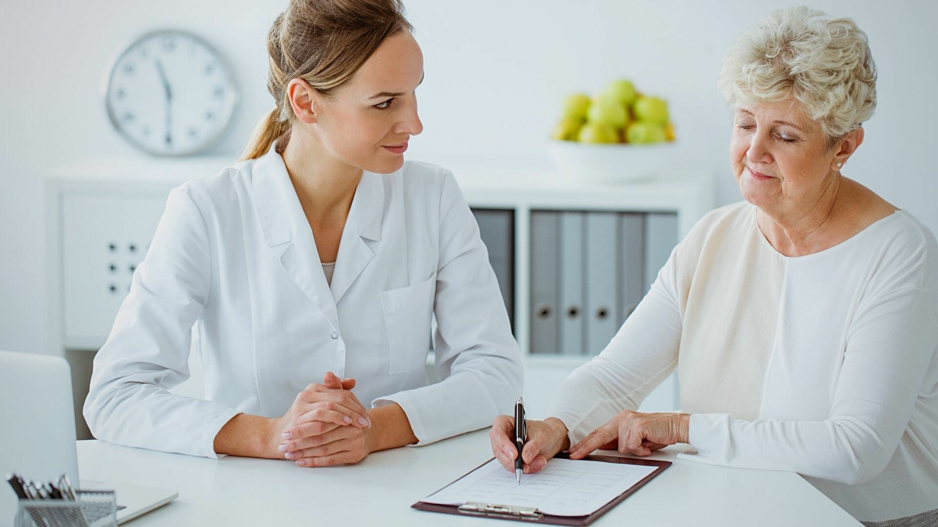 A woman consulting with a medical professional