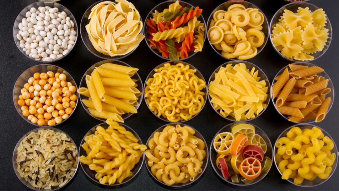 different pasta and noodles in bowls