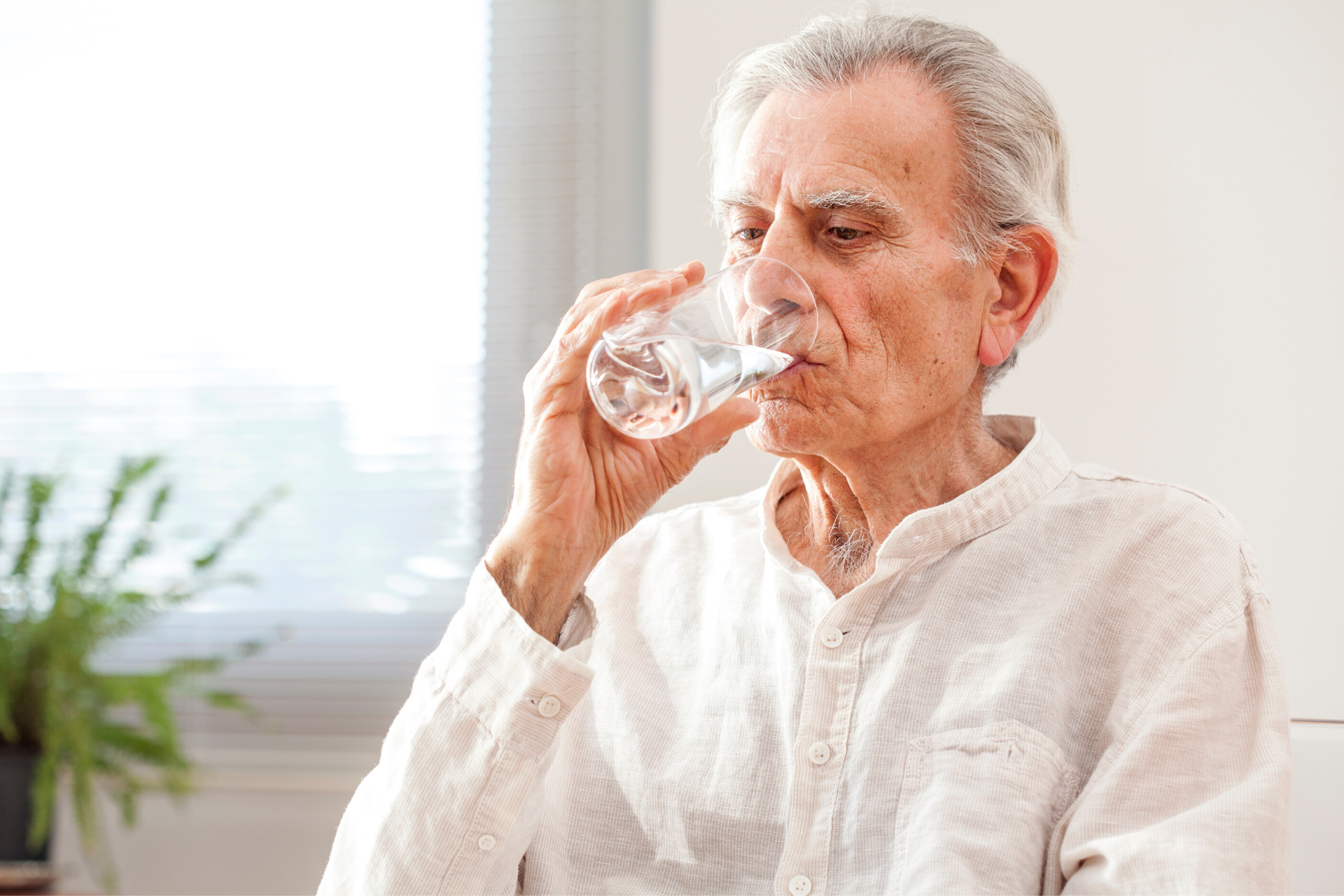 Old Man Drinking Water
