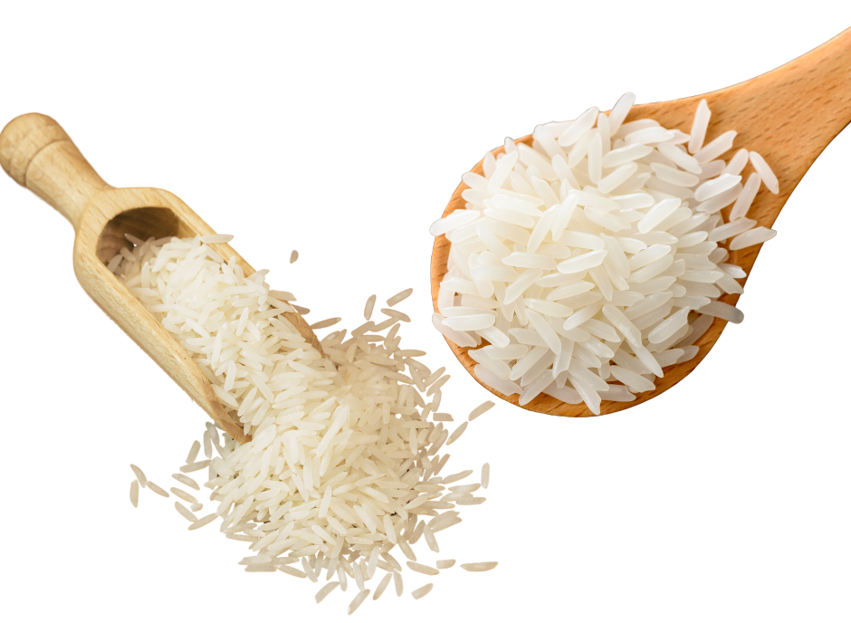 White rice in a wooden spoon on a white background.