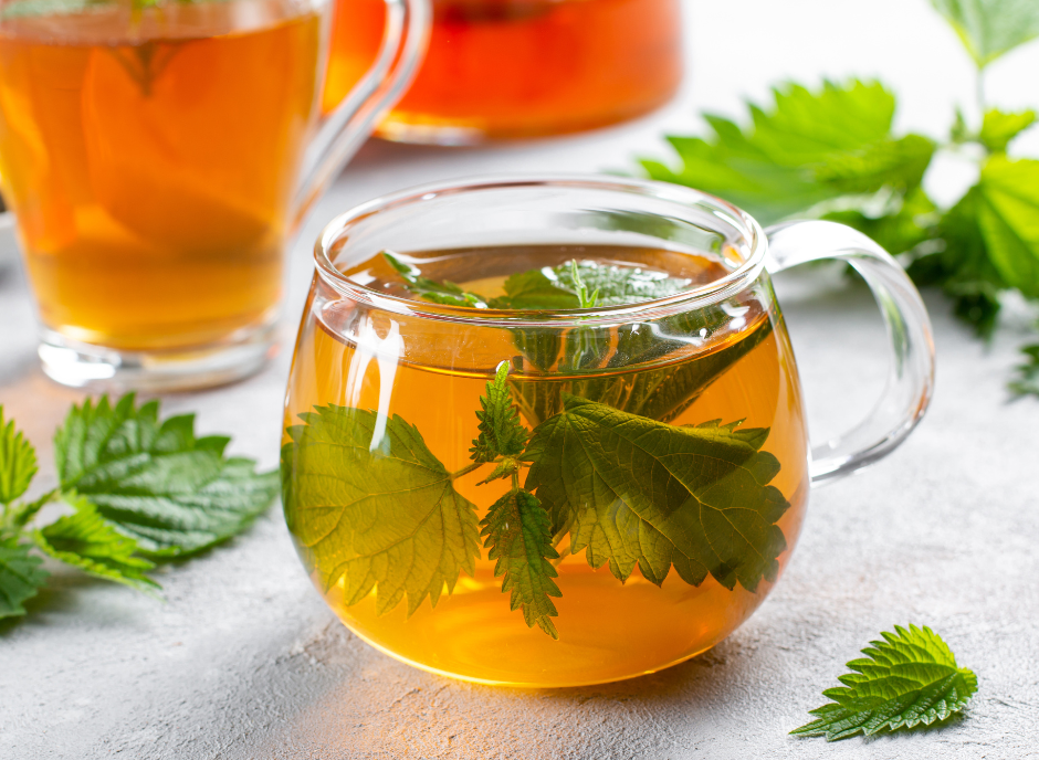 A cup of tea with refreshing mint leaves.
